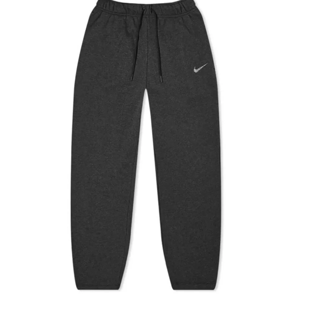 NIKE REVIVAL CROPPED SWEAT PANT